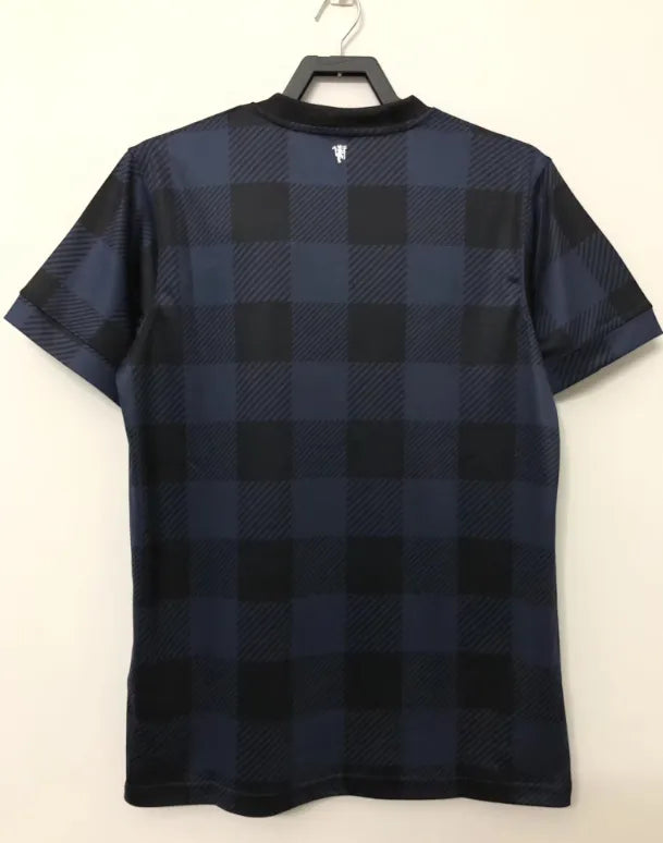 Retro de visitante del Manchester United 2013/2014