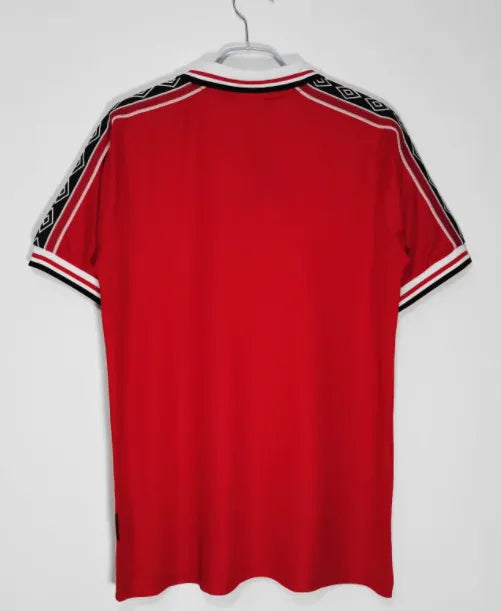 Retro local del Manchester United 1998/1999