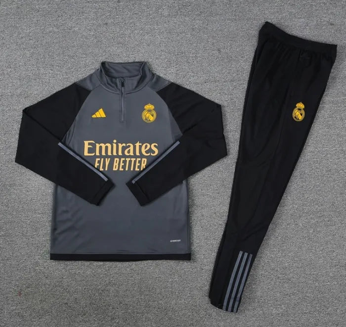 طقم رياضي رمادي بسحاب ربعي من ريال مدريد لموسم 2023/2024