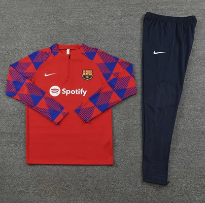 طقم رياضي أحمر بسحاب ربعي لفريق برشلونة لموسم 2023/2024