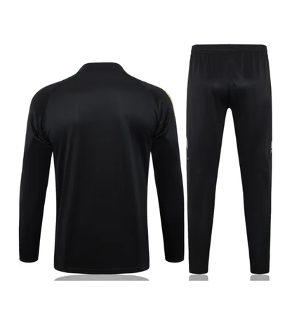 Chándal con cremallera 1/4 del Real Madrid 2025/2026 negro/dorado