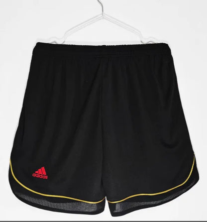 Pantalones cortos retro de local del AC Milan 2006/2007