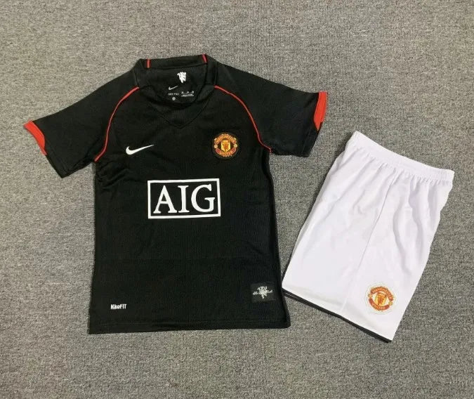 Conjunto retro de visitante del Manchester United 2007/2008 para niños