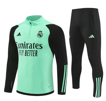 طقم رياضي أخضر بسحاب ربعي من ريال مدريد لموسم 2023/2024